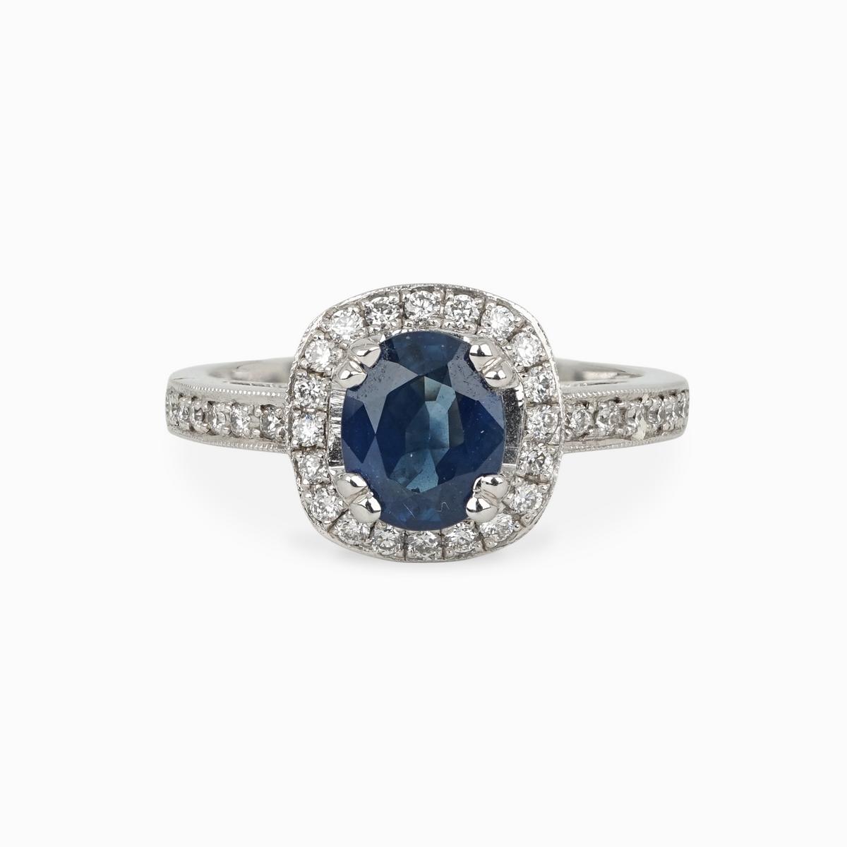 Oval Sapphire and Diamond Halo Ring